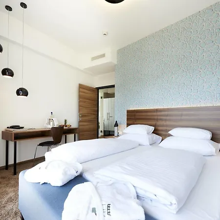 Otel Parkhotel Poertschach - Hotelresort Mit Insellage Am Woerthersee